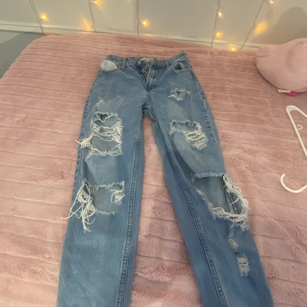 Light washed blue ripped jeans